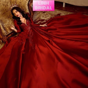 Extravagant red satin ball gown wedding/prom dress with red flower and glitter details