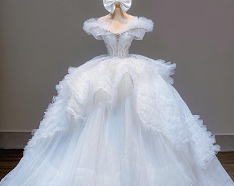 Magnificent princess lace white sweetheart neck ballgown wedding dress with tiered skirt and cathedral or chapel train