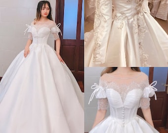 Beautiful royal vintage inspired white satin wedding dress with lace and train - various styles