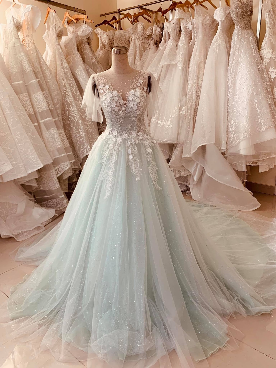 Pastel mint green floral lace flutter sleeve ball gown wedding image 1