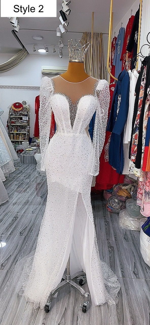 White long sleeve fishtail dress 2025