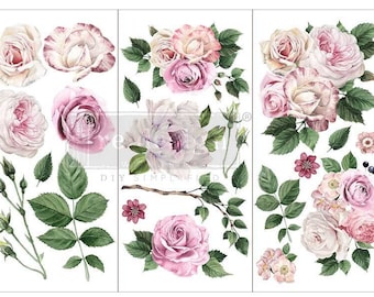 Puede incluir: Una lámina de transferencia floral decorativa con rosas en tonos rosa y crema, con hojas y tallos verdes. La lámina mide 30,4 cm de alto y 15,2 cm de ancho. El diseño incluye varios arreglos de rosas.
