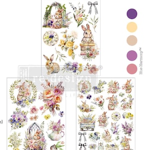 May include: Three sheets of decorative transfers featuring watercolor illustrations of bunnies, flowers, and bows. The sheets measure 11 inches (27.9 cm) in height and 8.5 inches (21.5 cm) in width. The color palette includes shades of purple, yellow, and pink.