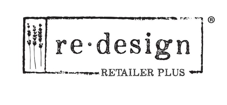 May include: Black and white logo for "re design RETAILER PLUS". The logo is in a rectangular frame with a lavender sprig on the left. The text is in a distressed font, giving it a vintage or handmade feel.