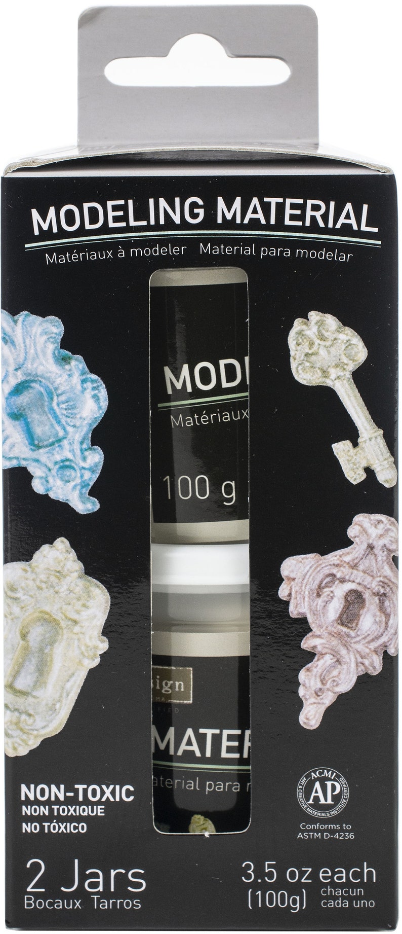 May include: Two jars of white modelling material, labelled "MODI Materiaux" and "MATER aterial para", with a black background and the text "MODELING MATERIAL Materiaux &agrave; modeler Material para modelar" at the top. The jars are 3.5 ounces each (100 grams) and are non-toxic.