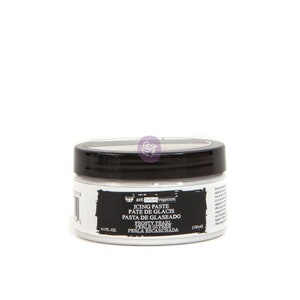 May include: A white jar of frosting paste labeled "art extravagance icing paste, pate de glacis, pasta de glaseado" with the flavor "frosty pearl, perle givree, perla escarchada". The jar is 4.1 fluid ounces or 120 milliliters.