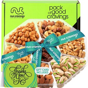 May include: A clear plastic tray filled with various nuts, including cashews, almonds, walnuts, and pistachios. The tray is tied with a teal ribbon that says "nut cravings" and "thank you." A gift card is included, and the box says "pack of good cravings."