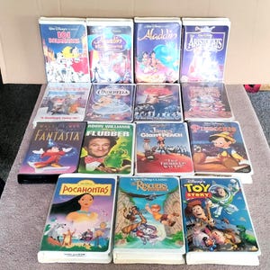 15 ~ Vintage 1990s Walt Disney VHS Movies Black Diamond, Masterpiece Collection in Clam Shell Cases
