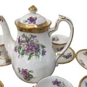 Royal Chelsea English Bone China Tea Set  Violet Floral Pattern And Brushed Gold Trim.