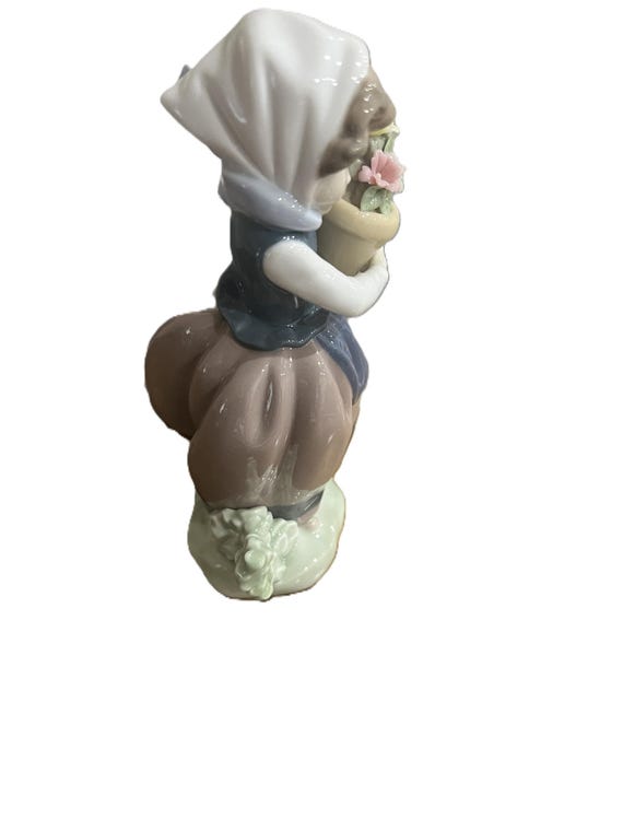 Lladro Porcelain ,figurine 5223 Spring is Here , Girl With Pot of