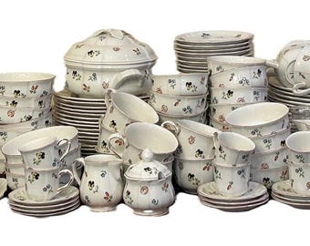 Villeroy & Boch Petite Fleur dinnerware set, featuring a delicate floral pattern on a white base.