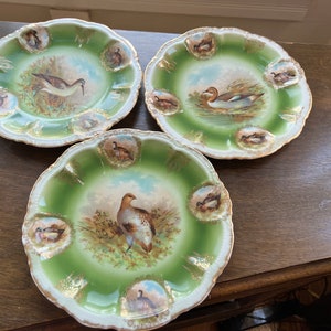 Antique PM Bavaria Hand Painted  Gilded Set Of 3 9 Inch Plates With Center Bird