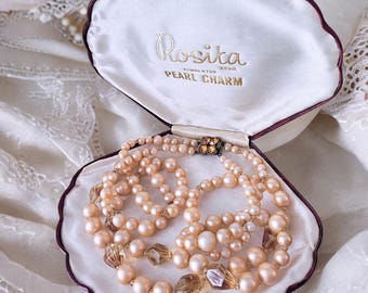 Beautiful vintage 1920s 1950s Art Deco triple strand pale pink pearl necklace with lucite clear beads with decorative diamante clasp