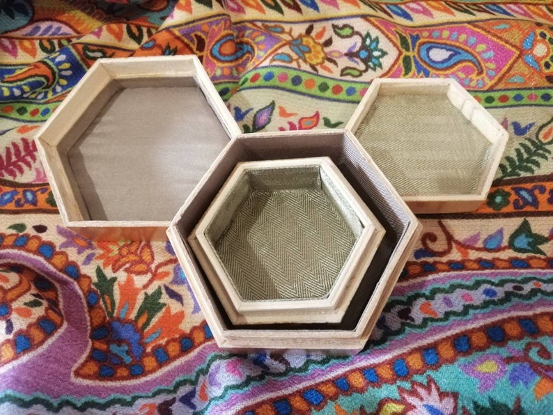 made in China pre-2000. Pair of vintage hexagonal Chinese wooden trinket boxes lacquered exterior and fabric-lined interior with fitted lid