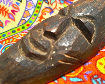 Vintage carved wooden tribal African mask, man's face, hard dark wood, made in Africa circa 20th century.