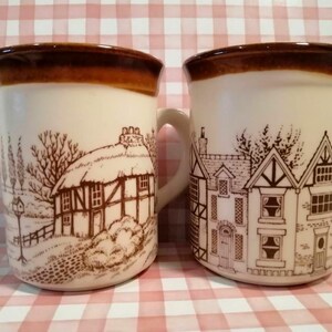 Vintage pair of matching stoneware mugs, as new, with complementing town & country scenes, made in England by Biltons Potteries circa 1980s.