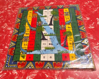 Vintage hand-painted Indian Snakes & Ladders board, Elephants and Demons, wooden with multi-coloured design, original packaging circa 1970s.