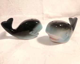 Vintage pair of novelty anthropomorphic whale ceramic salt & pepper shakers.  Hand-painted features, plastic stoppers, circa 1970s or 1980s.