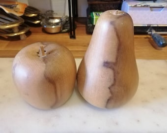 Beautiful pair of vintage hand-turned wooden salt & pepper shakers in the shape of an apple and a pear.  Finely detailed, woodgrained.