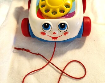Vintage Fisher Price Chatter Telephone, baby and toddler nursery toy, year 2000 model.
