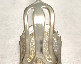 Silverplate serving tongs in original box, afternoon tea accoutrement circa 1960s or 1970s.