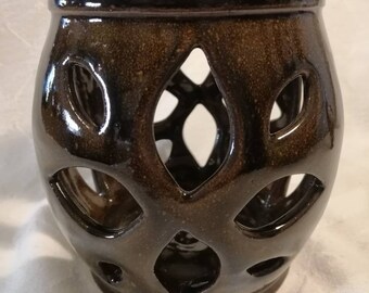 Vintage ceramic candle holder, suits tealights to larger candles, pierced to allow light to shine through, rustic clay & glaze, circa 1980s.