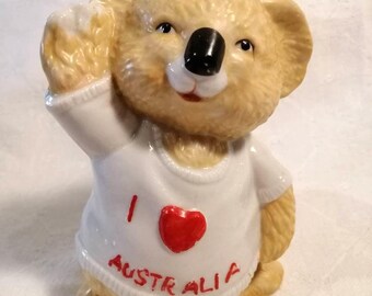 Vintage Australiana, ceramic koala wearing I Love (Heart) Australia t-shirt, glazed porcelain figural ornamentmade in Taiwan circa 1980s.