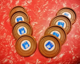 Two sets of four coasters commemorating the Centenary of the Ashes, 100 years of Test Match cricket between England & Australia, 1877-1977.