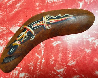 Vintage Australian hardwood non-returning boomerang with hand-painted platypus or goanna in black, white, red & ochre, circa 1950s or 1960s.