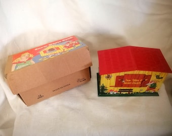 Snow White & The Seven Dwarves money box, colourful tin toy in labelled cardboard box, novelty action when coin inserted, made in India.