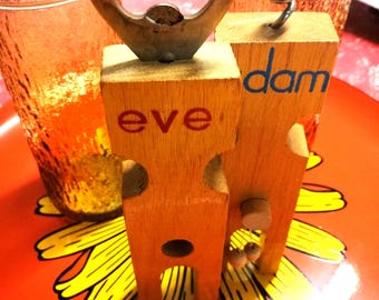 Vintage novelty Adam & Eve compact bottle opener and cork screw, mid-century sexual revolution piece, varnished blonde wood circa 1970s.