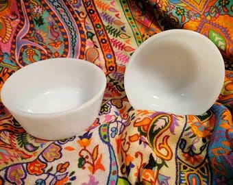 Vintage pair of ovenproof Anchor Hocking Fire King milk glass/white glass ramekins, utility bowls or custard cups, made in USA circa 1980s.