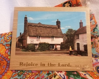 Vintage Christian spiritual memento, "Rejoice In The Lord Phil 4:4", colourised thatched house, St. Anian Craft Shop, circa 1950s or 1960s.