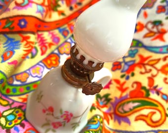 Vintage miniature hand-painted porcelain oil lamp, milk glass chimney & brass fittings with original unused cotton wick, circa 1970s.