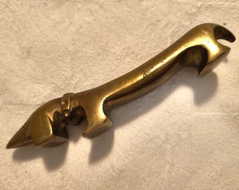 Mid-century Modern designer piece, hand-crafted brass dachshund bottle opener by Gerstenberg, West Germany, Cold War era, circa 1950s-1960s.