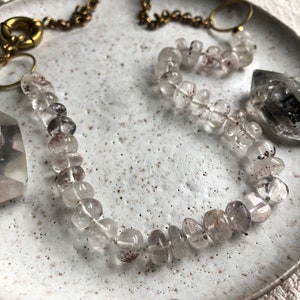 Beaded necklace / knitted silk cord / lepidocrocite gemstones