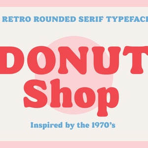 May include: A retro-style graphic design with rounded serif typeface in blue and red. The text reads "DONUT SHOP" with a pink circle behind the word "DONUT". The text "Inspired by the 1970's" is below the main text.