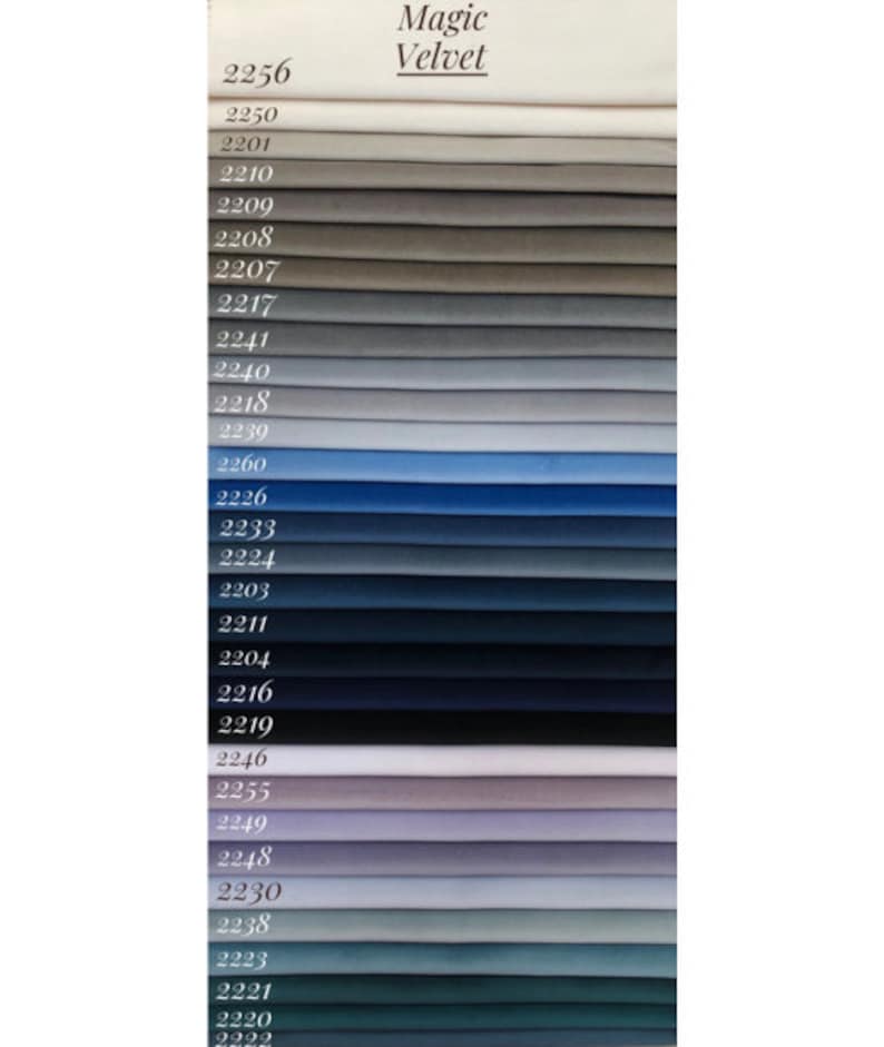 May include: A color chart of Magic Velvet fabric swatches. The swatches are arranged in rows from lightest to darkest, starting with a white swatch and ending with a dark blue swatch. The swatches are numbered with their corresponding color code.