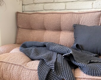 Sofá de suelo bouclé: asiento con respaldo, cojín a medida