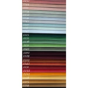 May include: Swatch card of Magic Velvet fabric samples in various colors, including red, green, brown, and yellow. The fabric swatches are numbered with a code, such as 2258, 2257, 2244, and so on.