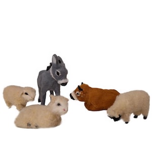 May include: A set of four plush farm animal figurines, including a gray donkey, a brown cow, and two white lambs. The figurines are made of soft, fuzzy material and are perfect for a nativity scene or a child's playroom.