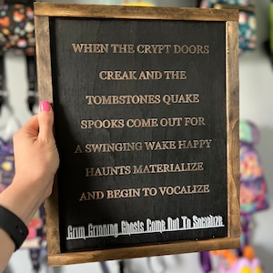 haunted mansion lyric sign