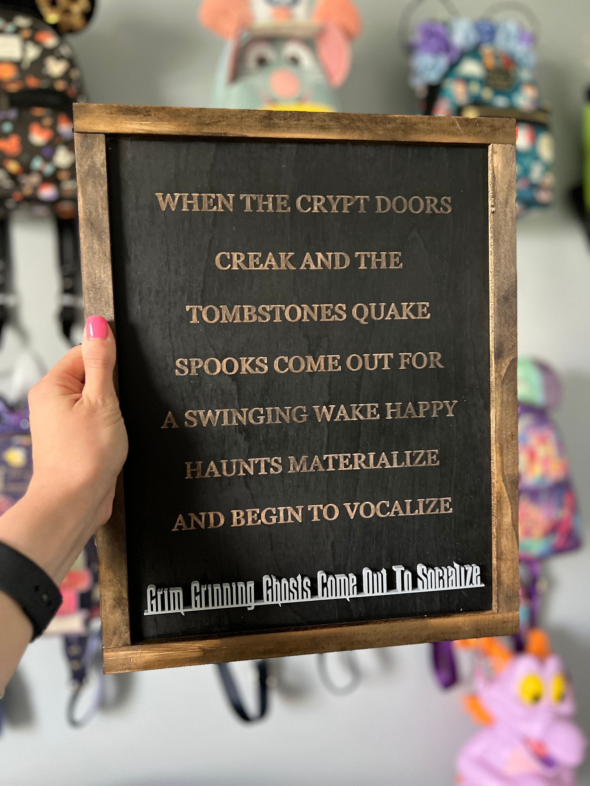 haunted mansion lyric sign