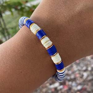 Heishi Bead Bracelet, beaded disc stretch bracelet, stacking beaded bracelets, blue heishi bracelet, blue, gold and white bracelet