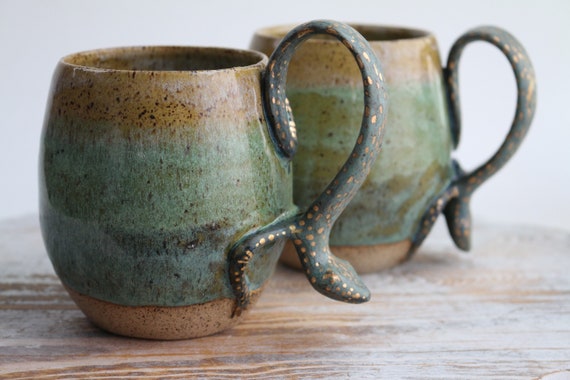 Handmade mug with lizard style handle in gold painting