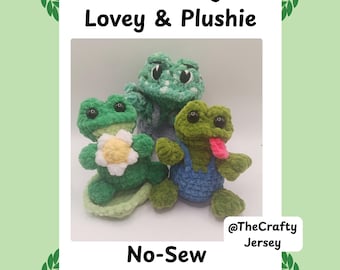 May include: Three crocheted frog plushies in shades of green, with one featuring a flower and another with a blue outfit and pink tongue. The image includes the text "Mini Frog Lovey & Plushie" and "No-Sew Crochet Pattern".