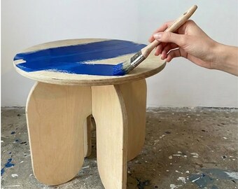 DIY stool/side table kit for self-assembly, design, painting, and varnishing, made of plywood, for assembly and disassembly.