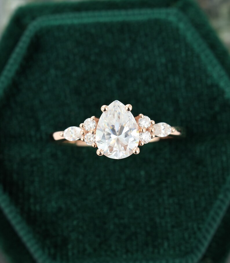 Pear shaped Moissanite engagement ring rose gold unique | Etsy