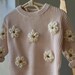 see more listings in the Embroidered Knit Sweater section