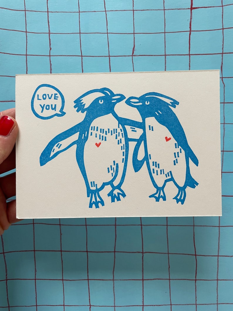 Penguins in love Postcard image 1